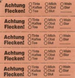 Marking tickets, orange, with text in German 
