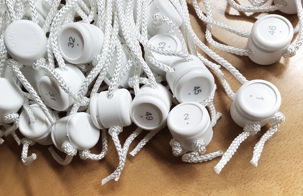 Cord net closure, surcharge for numbering 